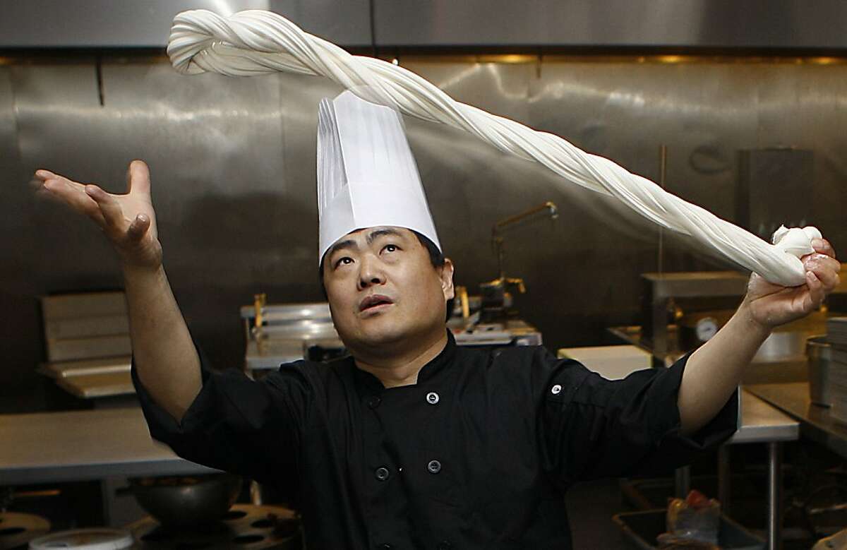 Master chef de cuisine Tony Wu shows how to pull noodles in Millbrae, Calif., on Thursday, August 23, 2012.