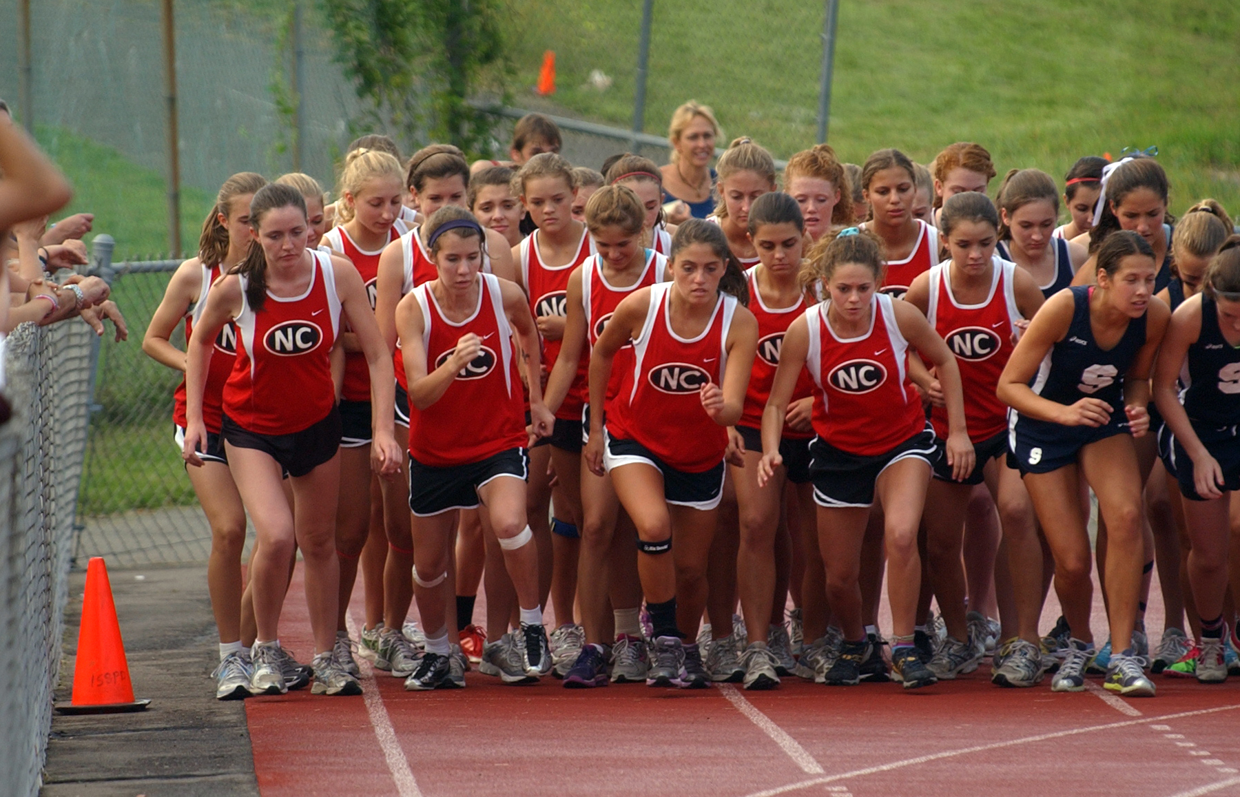 New Canaan girls cross country runners expect to be more competitive