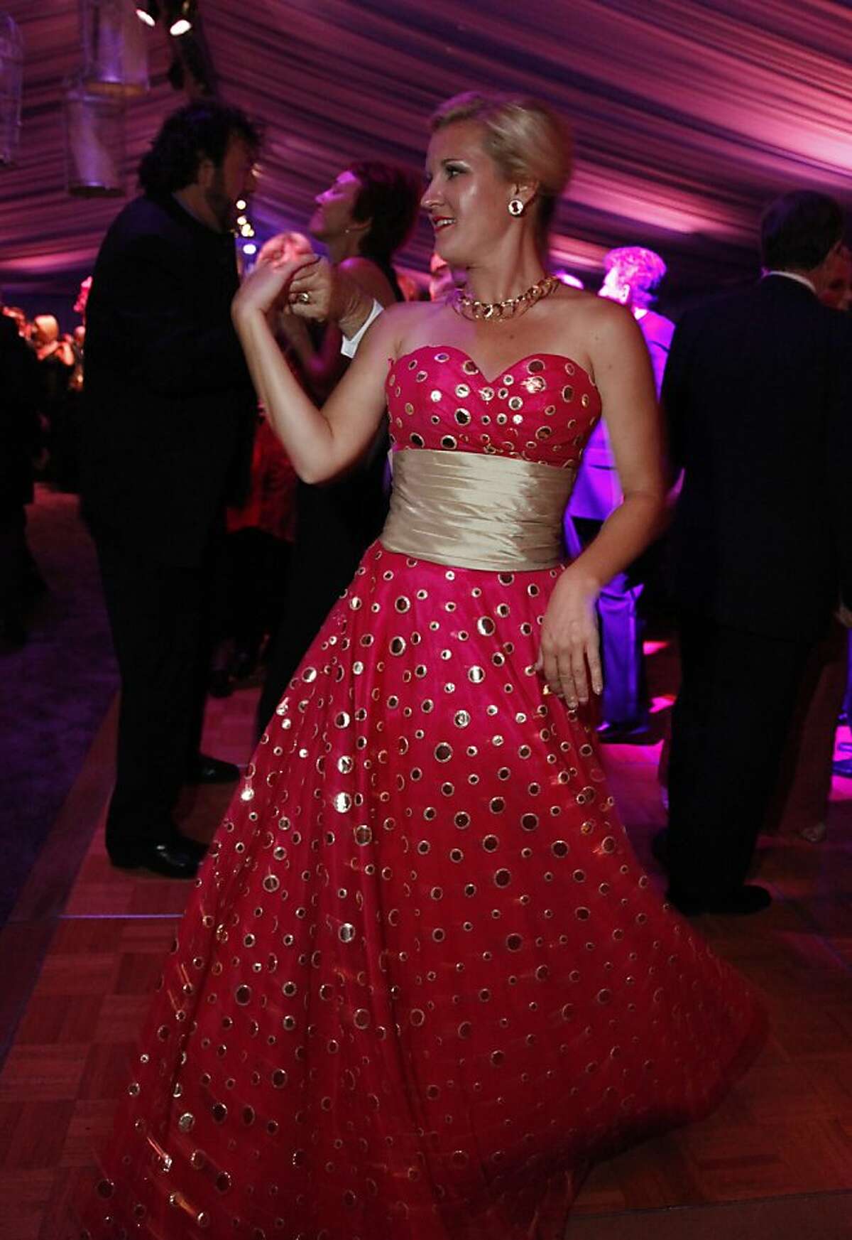 Danielle Mott dances during the after party of the San Francisco Opera's Opera Ball marking the beginning of its 90th season on Friday, Sept. 7, 2012. Those in attendance were entertained with Giuseppe Verdi?•s Rigoletto conducted by Music Director Nicola Luisotti for the season opener.
