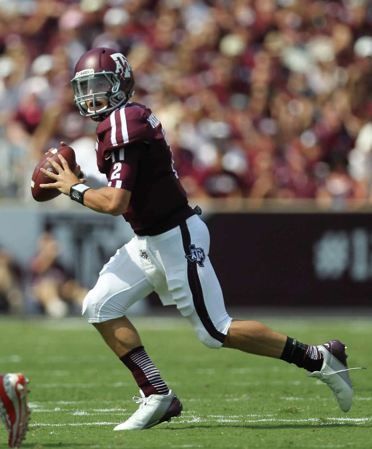 Texas A&M University quarterback Johnny Manziel (2) scrambles to find an open receiver during the first quarter of a NCAA football game against the University of Florida, Saturday, Sept. 8, 2012, at Kyle Field in College Station.