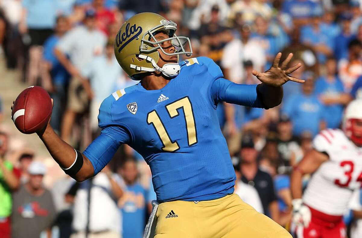 PASADENA, CA - SEPTEMBER 08: Quarterback Brett Hundley #12 of the UCLA Bruins throws a pass against the Nebraska Cornhuskers at the Rose Bowl on September 8, 2012 in Pasadena, California. (Photo by Stephen Dunn/Getty Images)