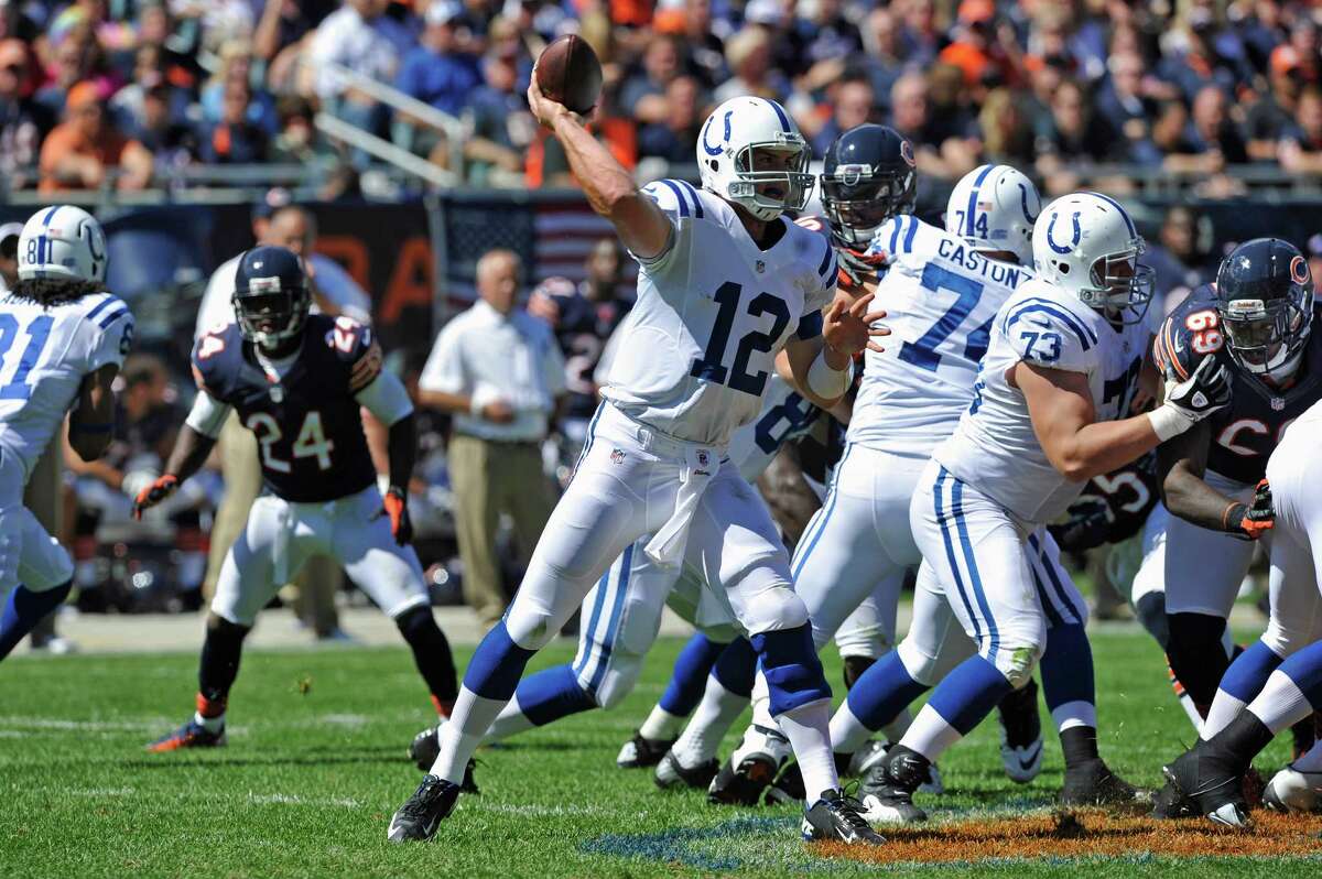Indianapolis Colts quarterback Andrew Luck (12) passes against the Chicago Bears during the first half of an NFL football game in Chicago, Sunday, Sept. 9, 2012. (AP Photo/Jim Prisching)