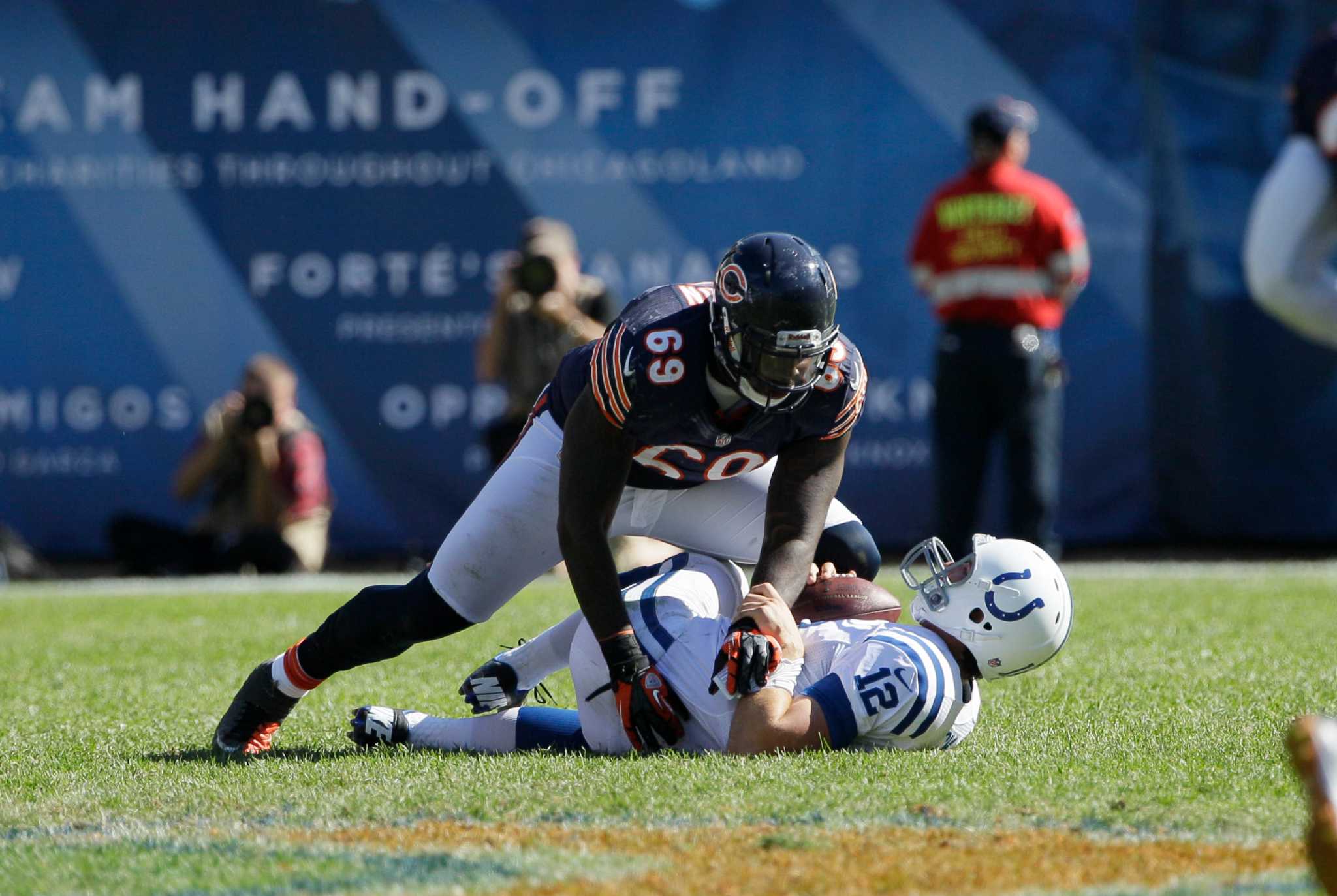 Chicago Bears defensive lineman Henry Melton (69) celebrates a