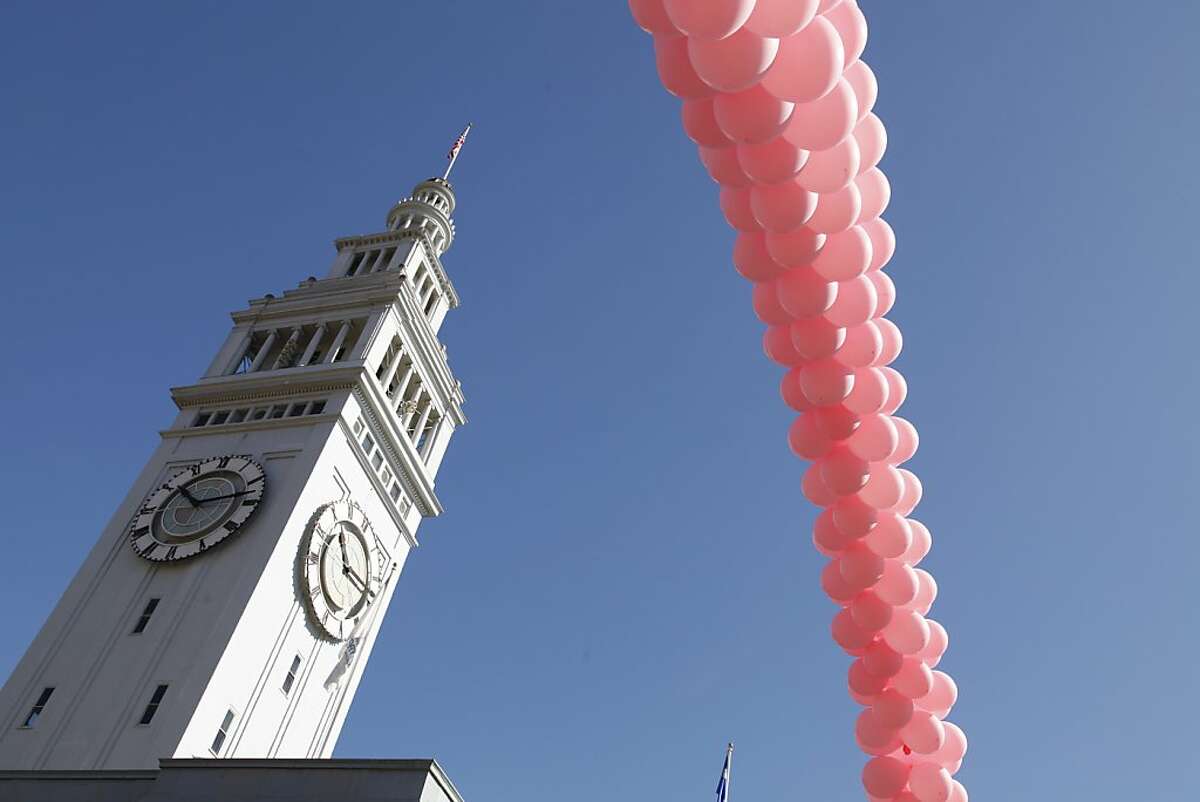 A pink balloon arch stretches across the Embarcadero to mark the beginning and finish line of the Susan G. Komen 22nd Annual Race For The Cure in San Francisco Calif. on Sunday, Sept. 9, 2012. The race series started as an 800 person event in Dallas in 1983 and now has more than 140 races with 1.6 million people participating on four continents.