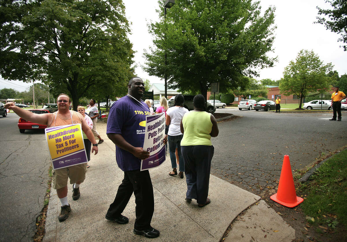 Healthcare union workers picket in front of West River Health Care at 245 Orange Avenue in Milford on Thursday, September 6, 2012. The workers have been on strike for months, after refusing what they see as an unfair contract offer by the nursing home's owner, HealthBridge.