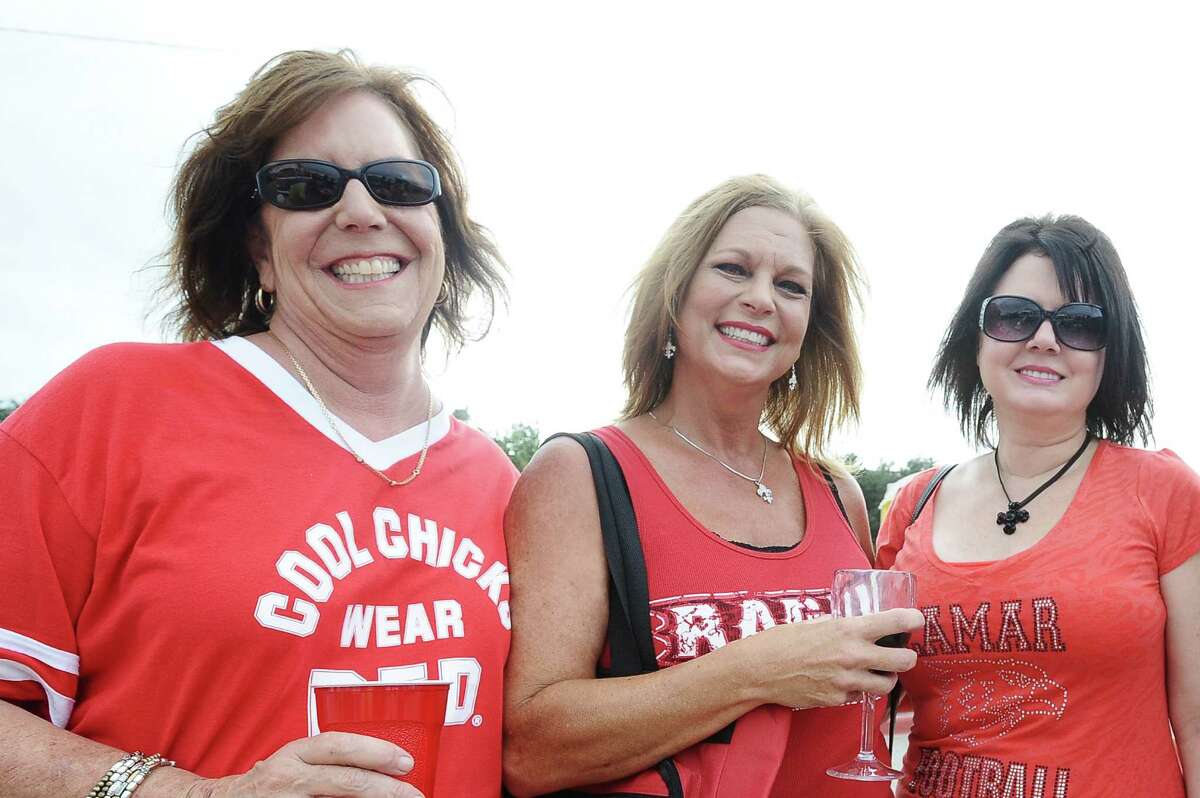 Lamar fans Pattie Sylvester, Marianne Petry, and Jan Walker kick off the first home game tailgating at Provost Umphrey Stadium on Saturday, September 8, 2012. Photo taken: Randy Edwards/The Enterprise