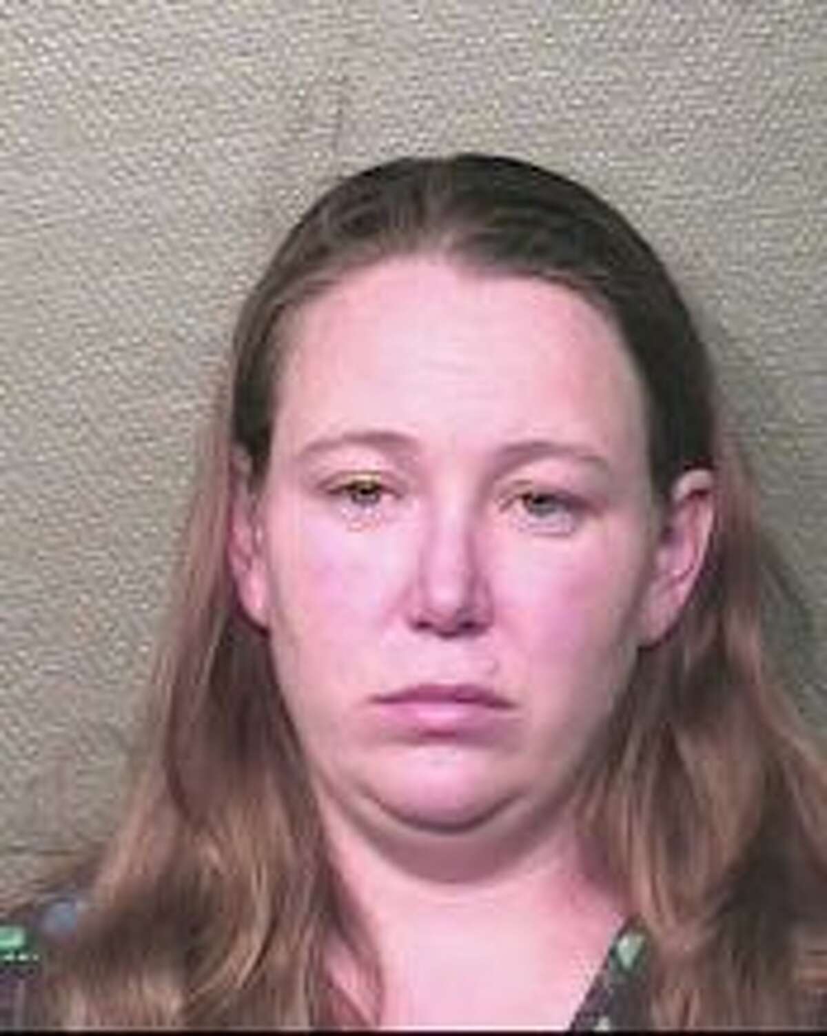 Amy Dawn Cooney (DOB: 11-12-80), of Houston, is charged with endangering a child. (HC)
