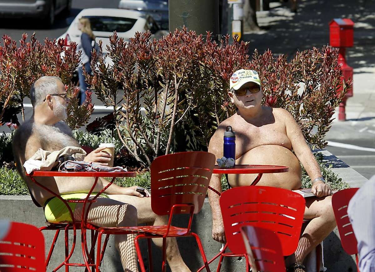 Dean W. (left) who still had his underwear on, and Ray soaked up the sun in the plaza at Castro and Market Streets Monday September 10, 2012. Neither chose to give their last names. San Francisco Supervisor Scott Weiner has apparently reversed his position on the naked guys who hang out at Castro and Market Streets.