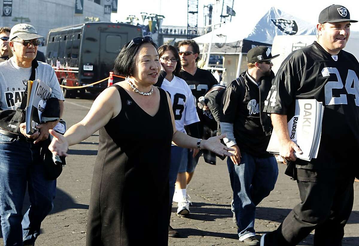 Mayor Jean Quan greets Oakland Raiders fans before the game against the San Diego Chargers in Oakland, Calif. on Monday, Sept. 10, 2012.
