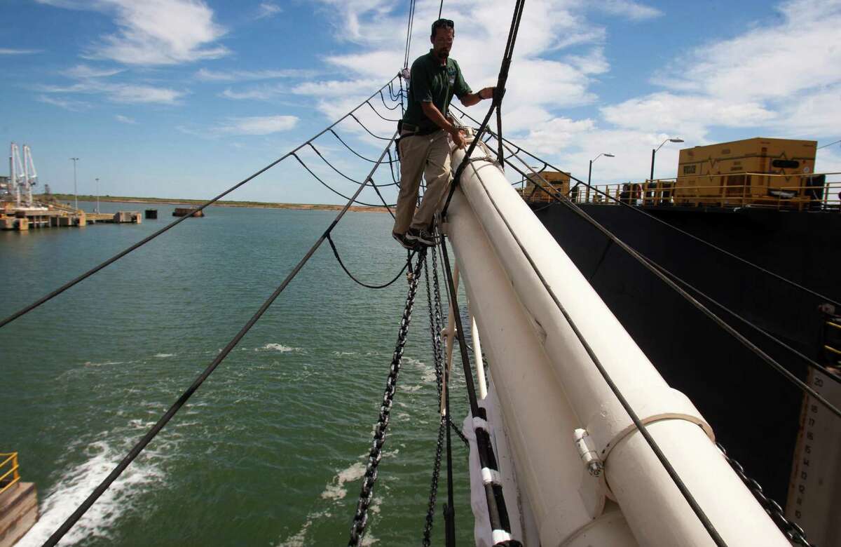 Elissa crew member Mark Scibinico secures rigging after the tall ship left Galveston to go into dry dock in Texas City on Monday. Much of the Elissa's hull may be saved.