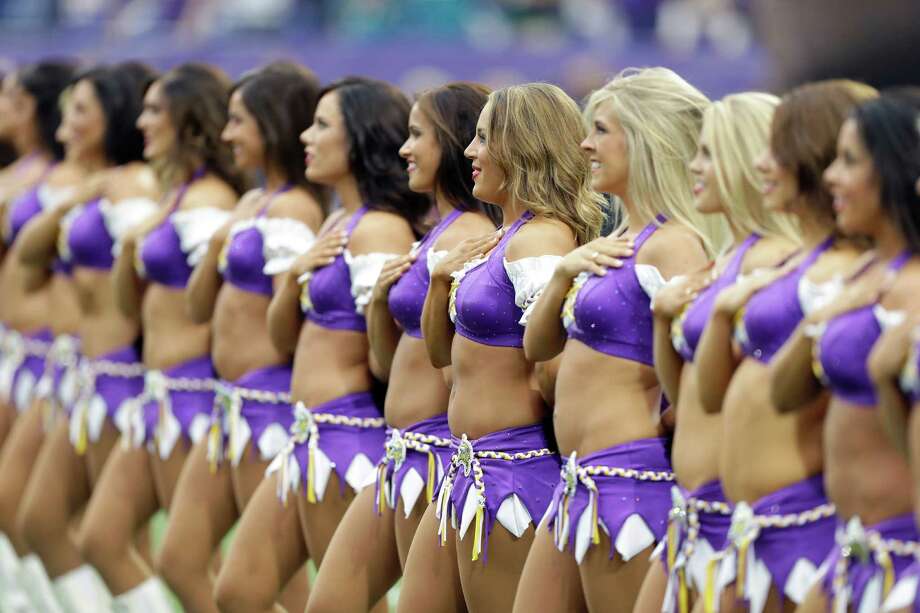 Minnesota Vikings cheerleaders perform during the first half of an NFL foot...