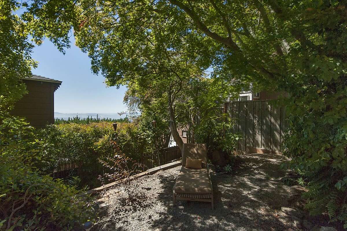 Oakland home with lush yard, views