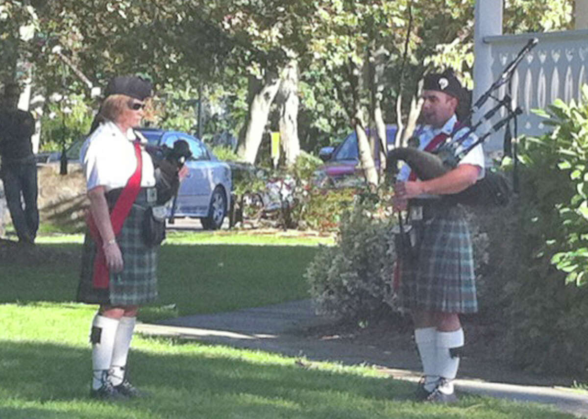 Bagpipers in mournful tribute to memory of terror victims