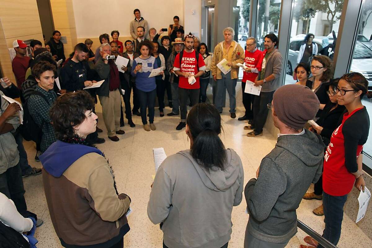 A group of students, faculty, employees and interested members of the community gather before a CCSF Board of Trustees meeting on Tuesday, Sept. 11, 2012 at the City College of San Francisco's chinatown campus. The board of trustees decided to ask the state for a special trustee to help them preserve their accreditation which many oppose.
