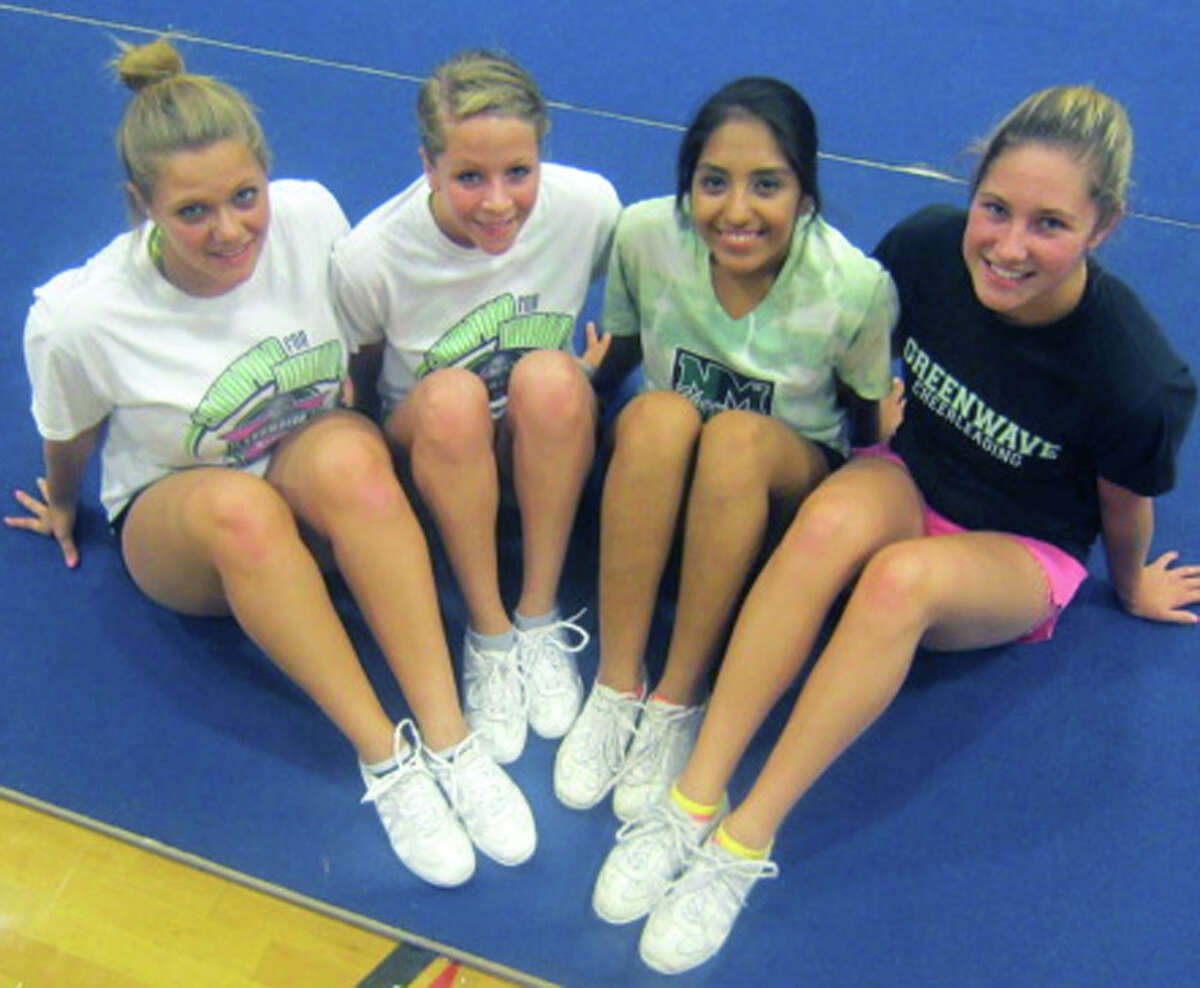 Captaining the New Milford High School cheerleaders this fall are, from left to right, Ashley Galanti, Lisa Fredlund, Diana Ortega and Kim Carlson. September 2012