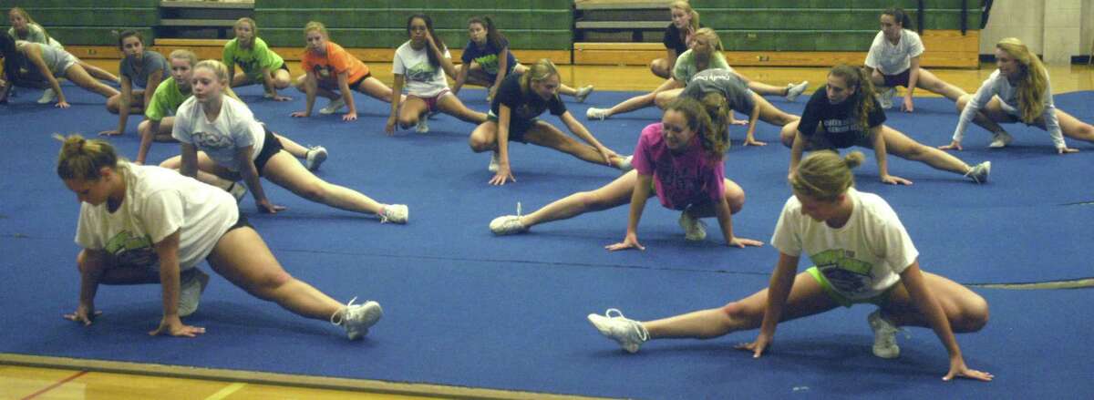 The New Milford High School cheerleaders hope to stretch their skills during the fall season. September 2012