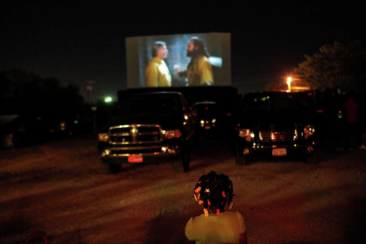 Myah Jones, 7, of Ft. Worth, watches Men in Black 3 at the Brazos Drive-in Theatre in Granbury on Saturday, August 11, 2012.