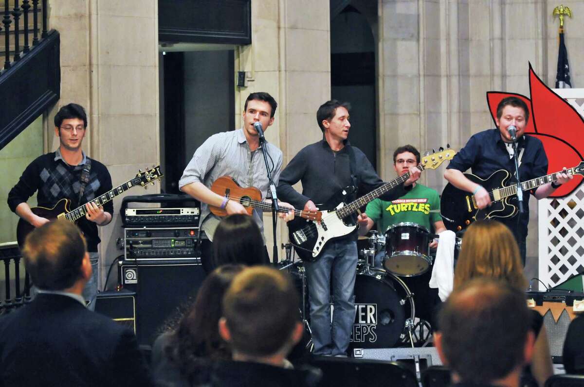 Local rock band The City Never Sleeps performs at a news conference to announce details of the 2012 Albany Tulip Festival at Albany City Hall Tuesday April 10, 2012. (John Carl D'Annibale / Times Union)