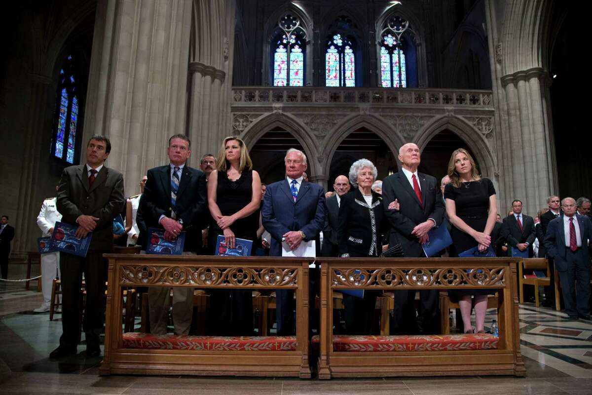 Former astronauts Buzz Aldrin, center, Annie Glenn, and her husband, astronaut, and former Ohio Sen. Sen. John Glenn, second from right, take part in a memorial service for Apollo 11 astronaut Neil Armstrong, Thursday, Sept. 13, 2012, at the National Cathedral in Washington. (AP Photo/Evan Vucci, Pool)