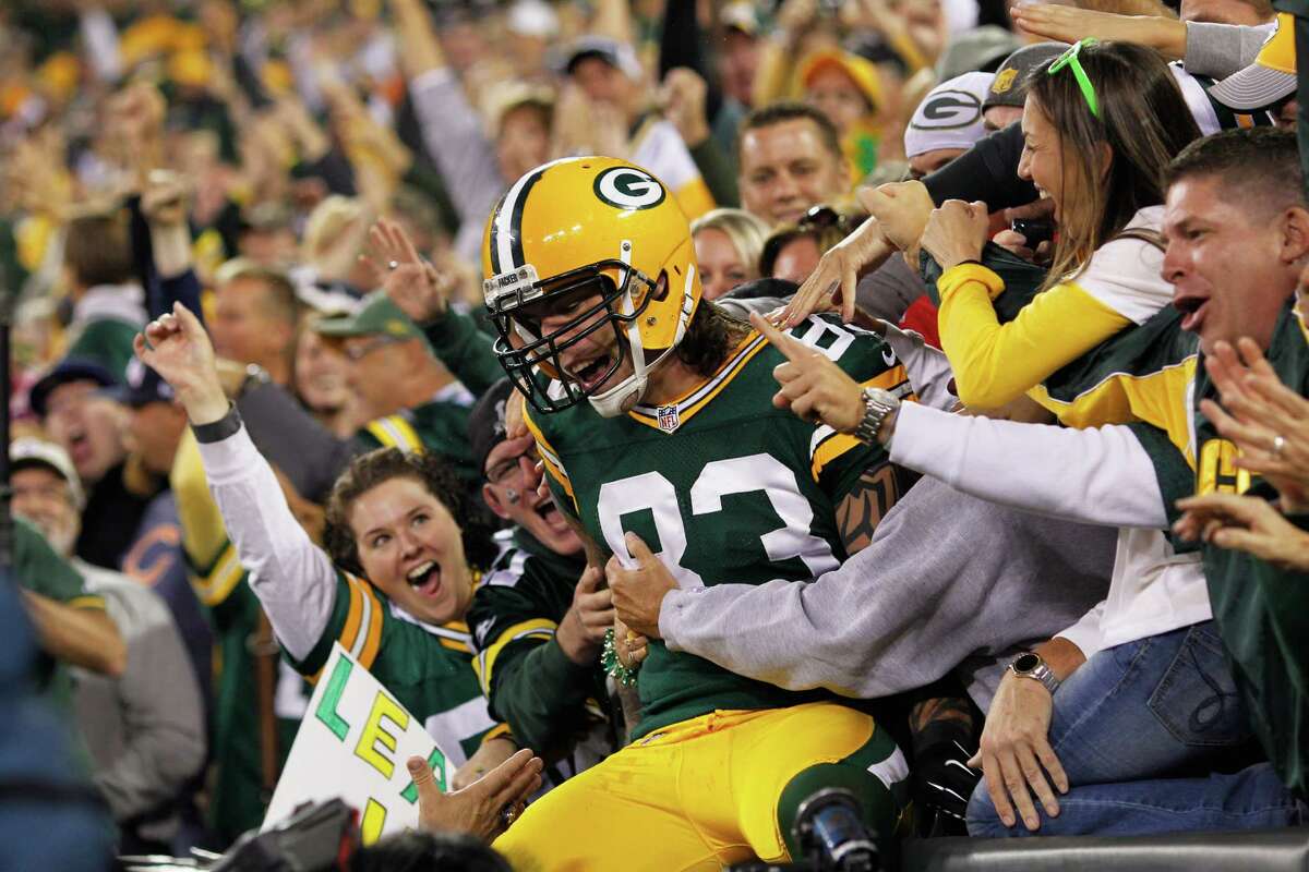 Green Bay Packers' Donald Driver celebrates his reception, to