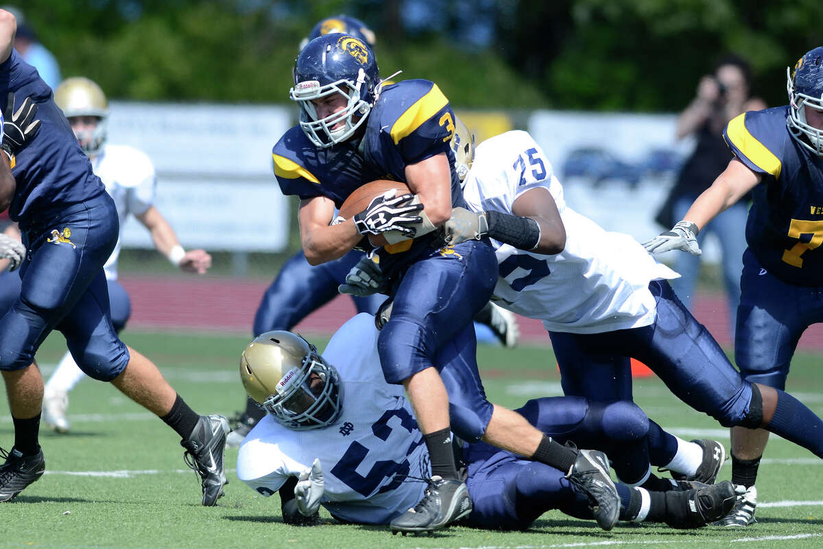 Weston football rolls past Notre DameFairfield in opener