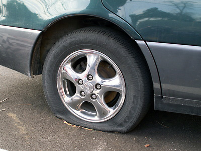 Car tires flattened en masse on Highway 24