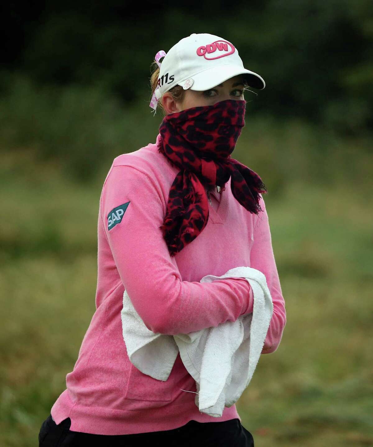 Paula Creamer braces for the conditions during the final round.