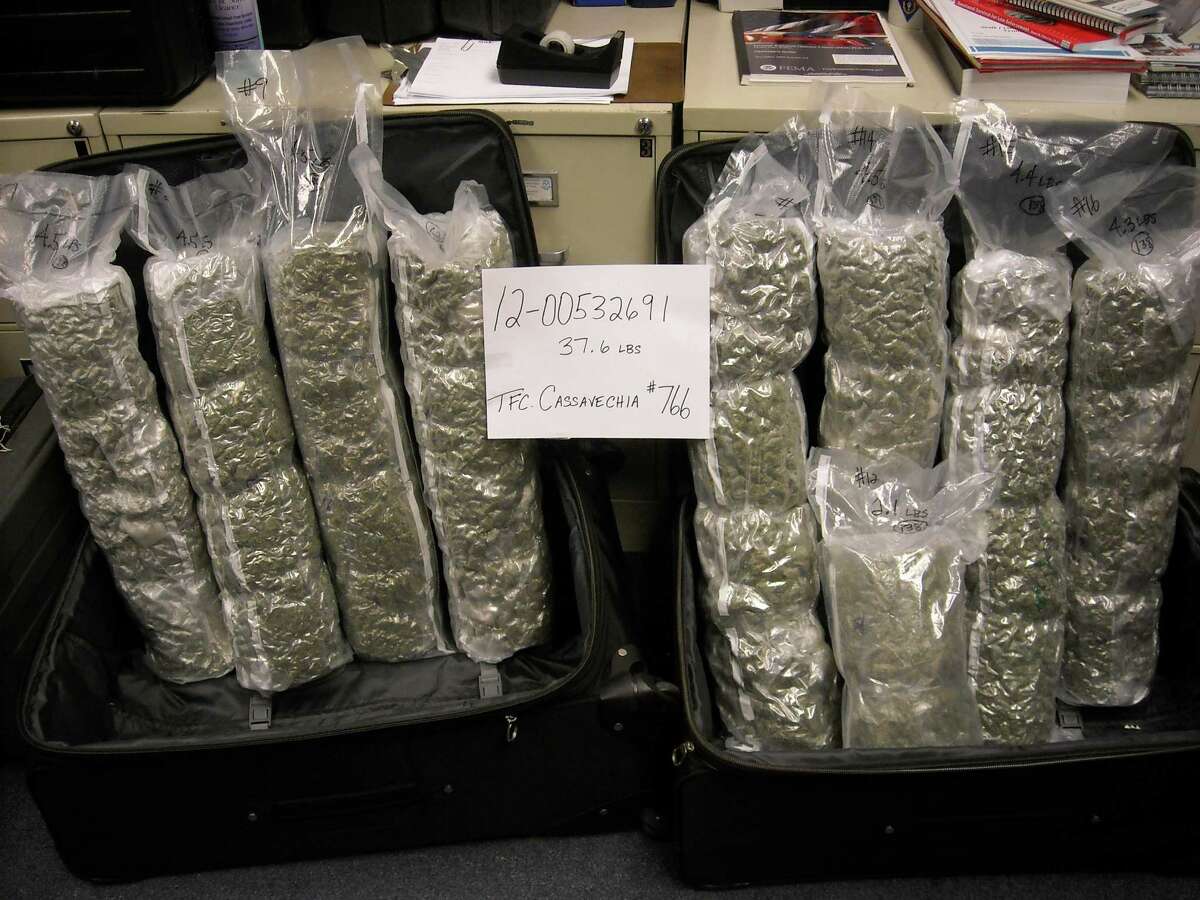 A 28-year-old West Hartford man was arrested Monday, Sept. 17, 2012, after police say they found nearly 40 pounds of marijuana stashed in two suitcases in his car.