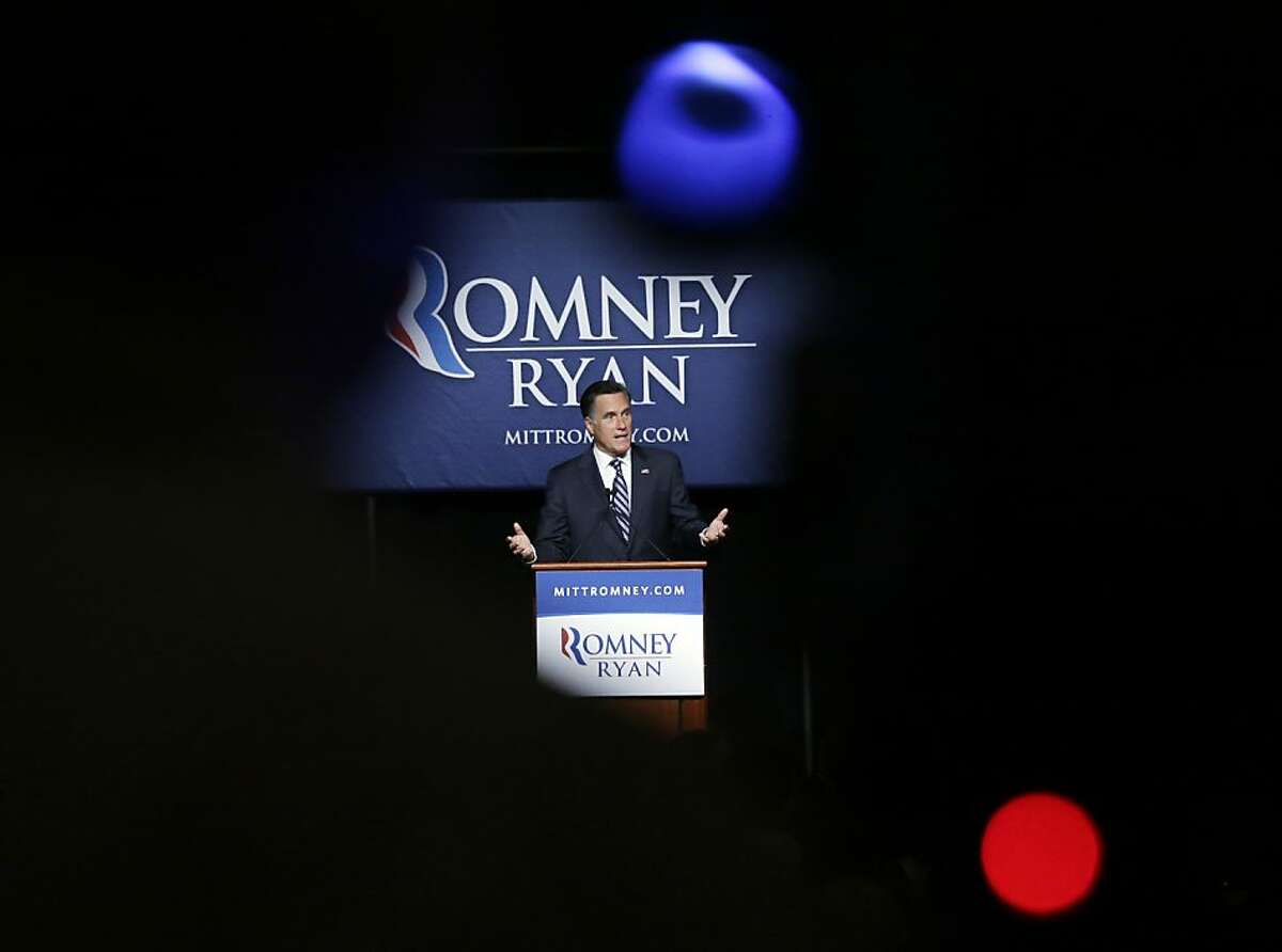 Lunch is served as Republican presidential candidate and former Massachusetts Gov. Mitt Romney speaks at a campaign fundraising event, the first of which reporters' cameras were allowed in, at The Grand America in Salt Lake City, Utah, Tuesday, Sept. 18, 2012.