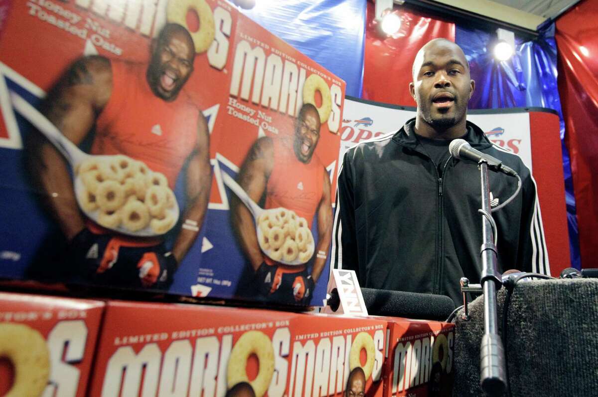 Buffalo Bills' Mario Williams, an NFL football player, introduces his new cereal during a news conference in West Seneca, N.Y., Tuesday, Sept. 18, 2012. (AP Photo/David Duprey)