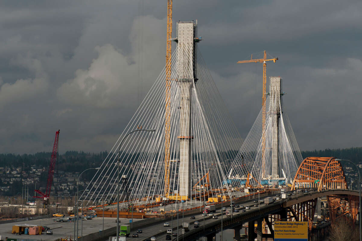 The Port Mann Bridge, in British Columbia, became the world's widest bridge, at 213 feet, when it opened in 2012. The bridge crosses the Fraser River, connecting Coquitlam to Surrey, near Vancouver. 