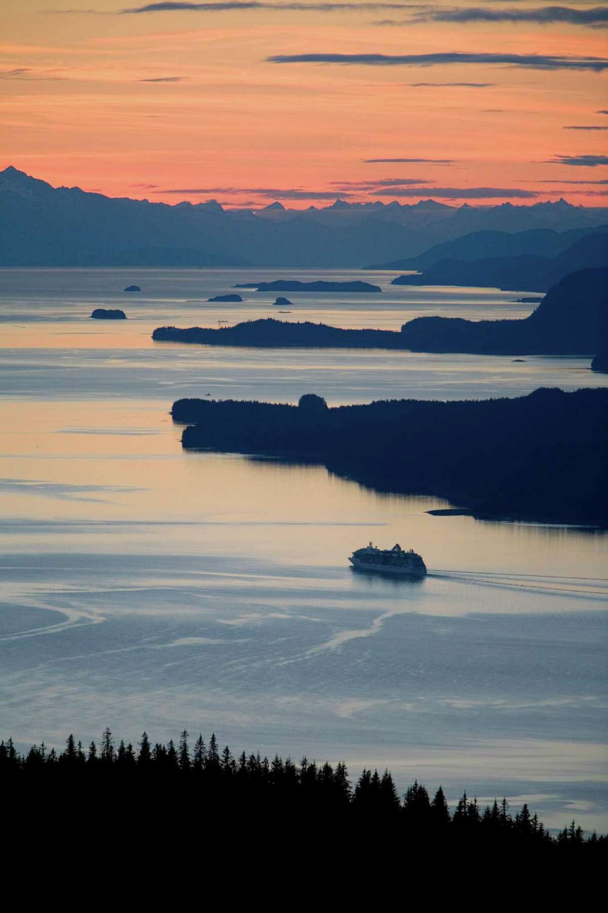 Sunset with Cruise ship heading north in Stephens Passage west of Juneau Southeast Alaska