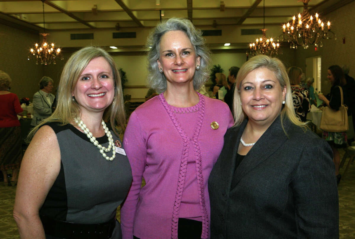 OTS/HEIDBRINK - President Debbie Callihan-Dingle, from left, and sustainers Alison Boone and Teri Cardenas gather at the Jr. League of San Antonio Sustainers luncheon at the Bright Shawl on 9/11/2012. names checked photo by leland a. outz