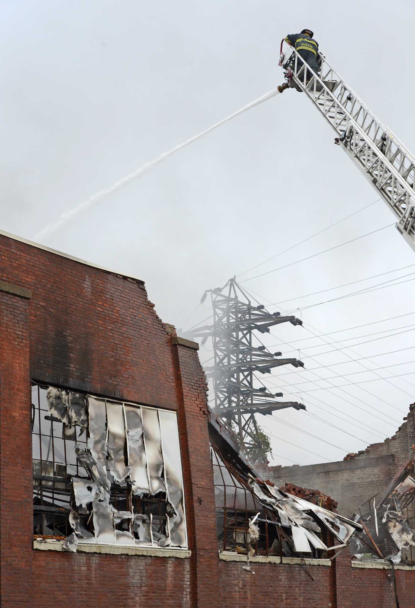 Cohoes business back at work despite fire