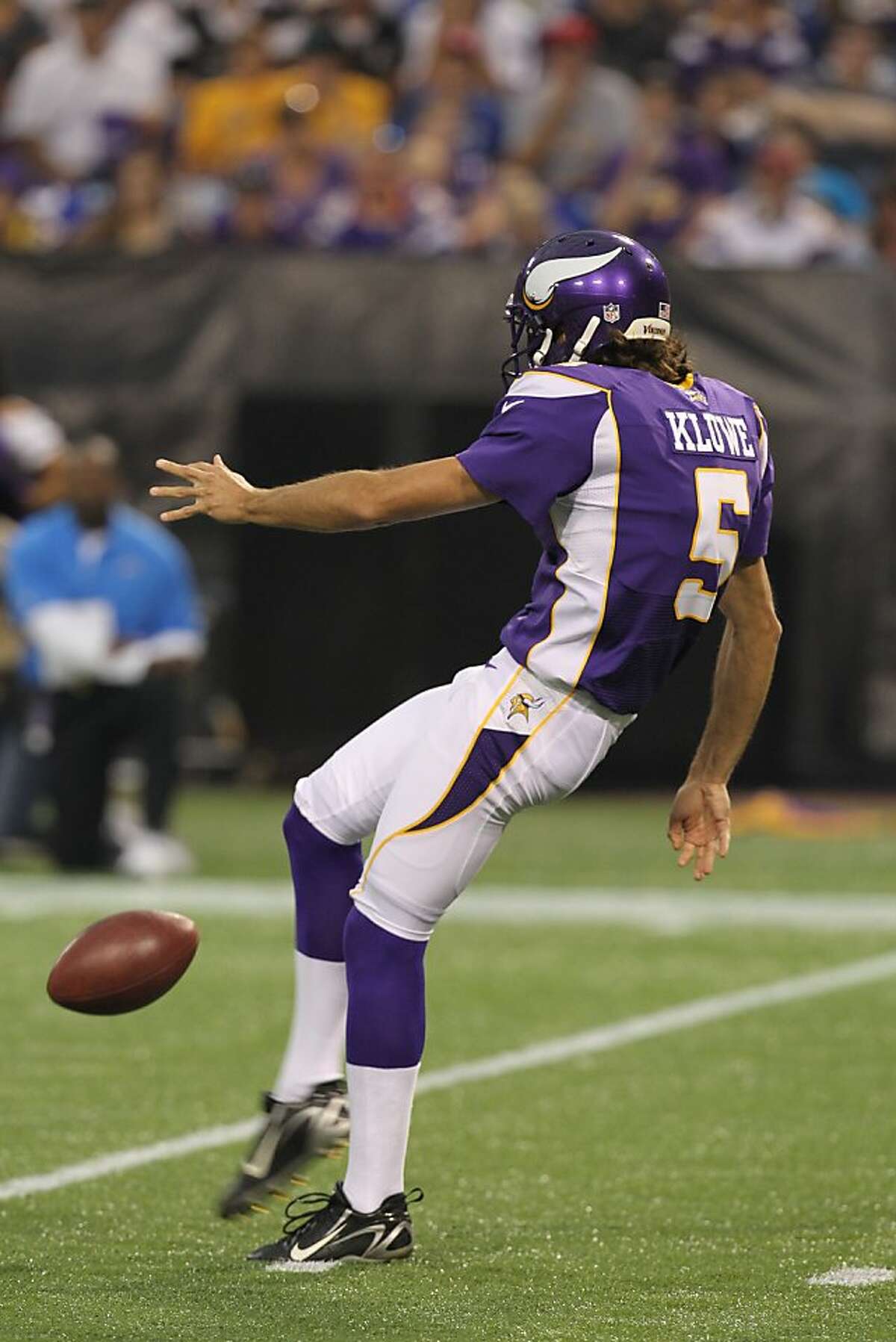 Minnesota Vikings punter Chris Kluwe (5) kicks in the first half of an NFL preseason football game against the San Diego Chargers Friday, Aug. 24, 2012 in Minneapolis. (AP Photo/Genevieve Ross)