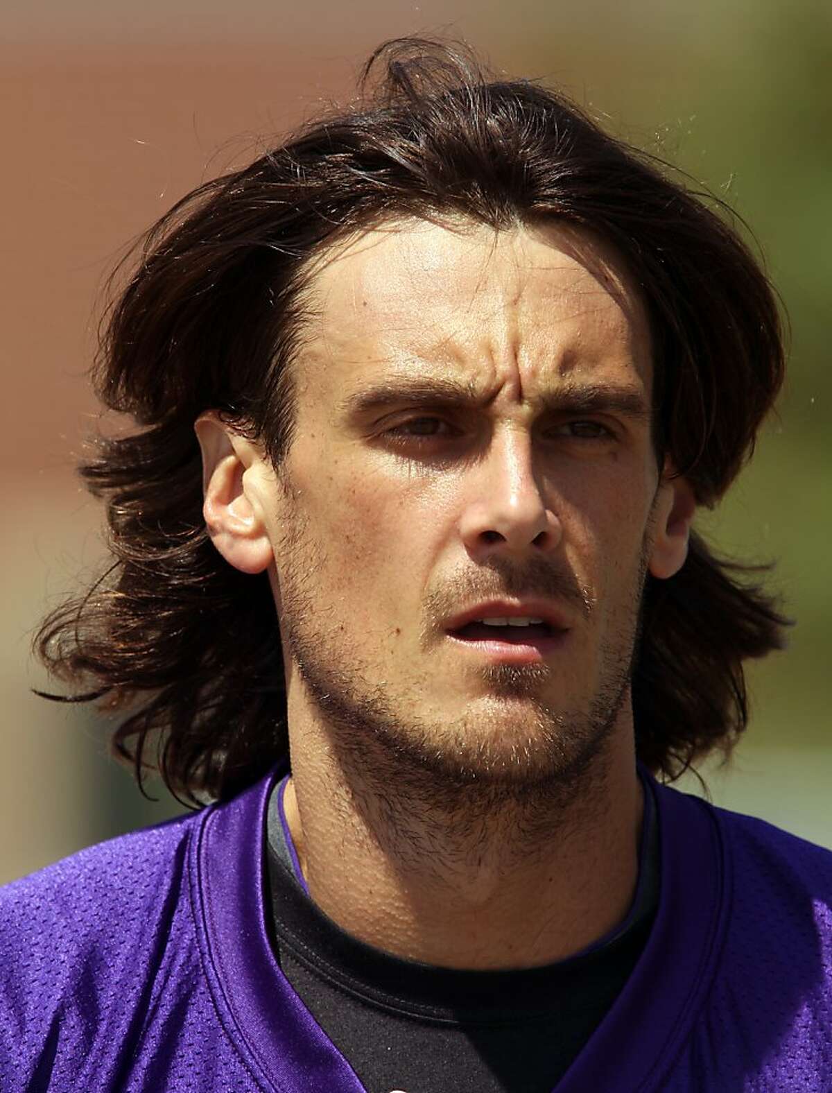 In this July 28, 2012 photo, Minnesota Vikings punter Chris Kluwe is shown at NFL football training camp in Mankato, Minn. NFL punters are only seen on fourth down, and heard from less than that. But with a constitutional gay marriage ban on Minnesota's ballot this fall, Kluwe has emerged as a high-profile gay rights champion _ and a symbol of changing attitudes toward homosexuality in the sports world. (AP Photo/Genevieve Ross)