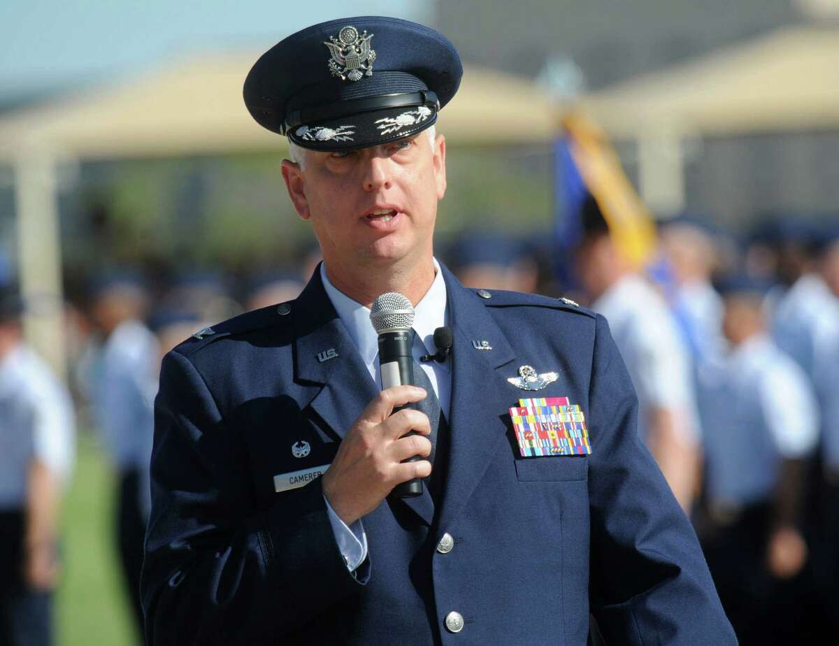 Col. Mark Camerer speaks during a graduation ceremony for airmen completing basic training at JBSA-Lackland on Friday, Sept. 21, 2012.