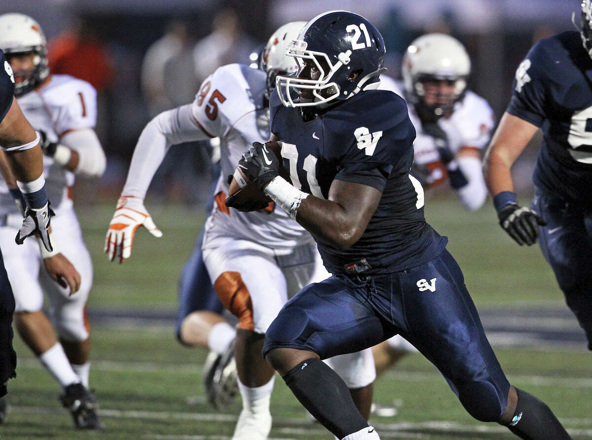 Lawrence Mattison blows through the middle for a first quarter touchdown as Smithson Valley hosts Madison on September 21, 2012.