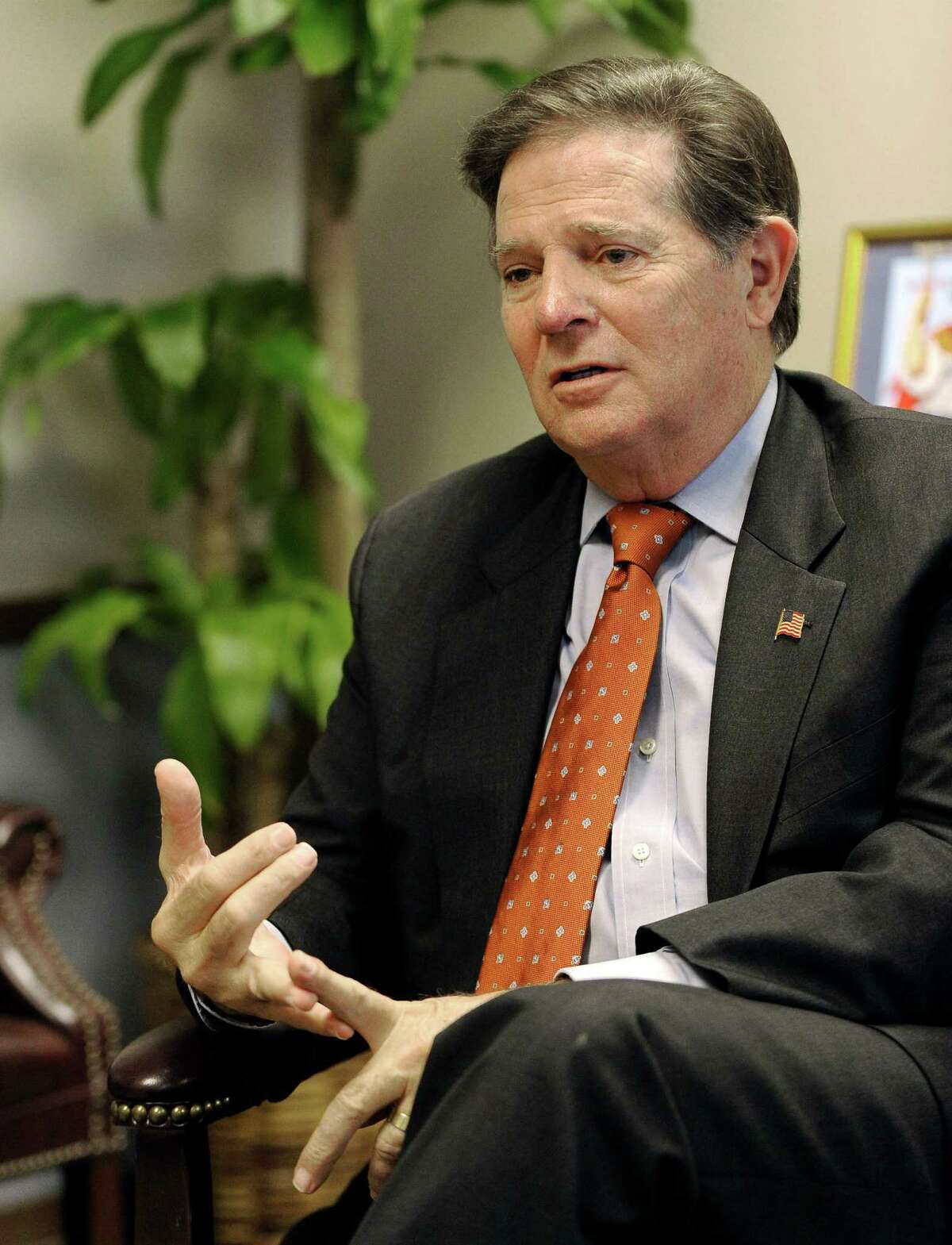 In this Wednesday, Sept. 19, 2012 photo, former House Majority Leader Tom DeLay speaks about his upcoming appeal on a money laundering conviction at his attorney's office in Houston. (AP Photo/Pat Sullivan)