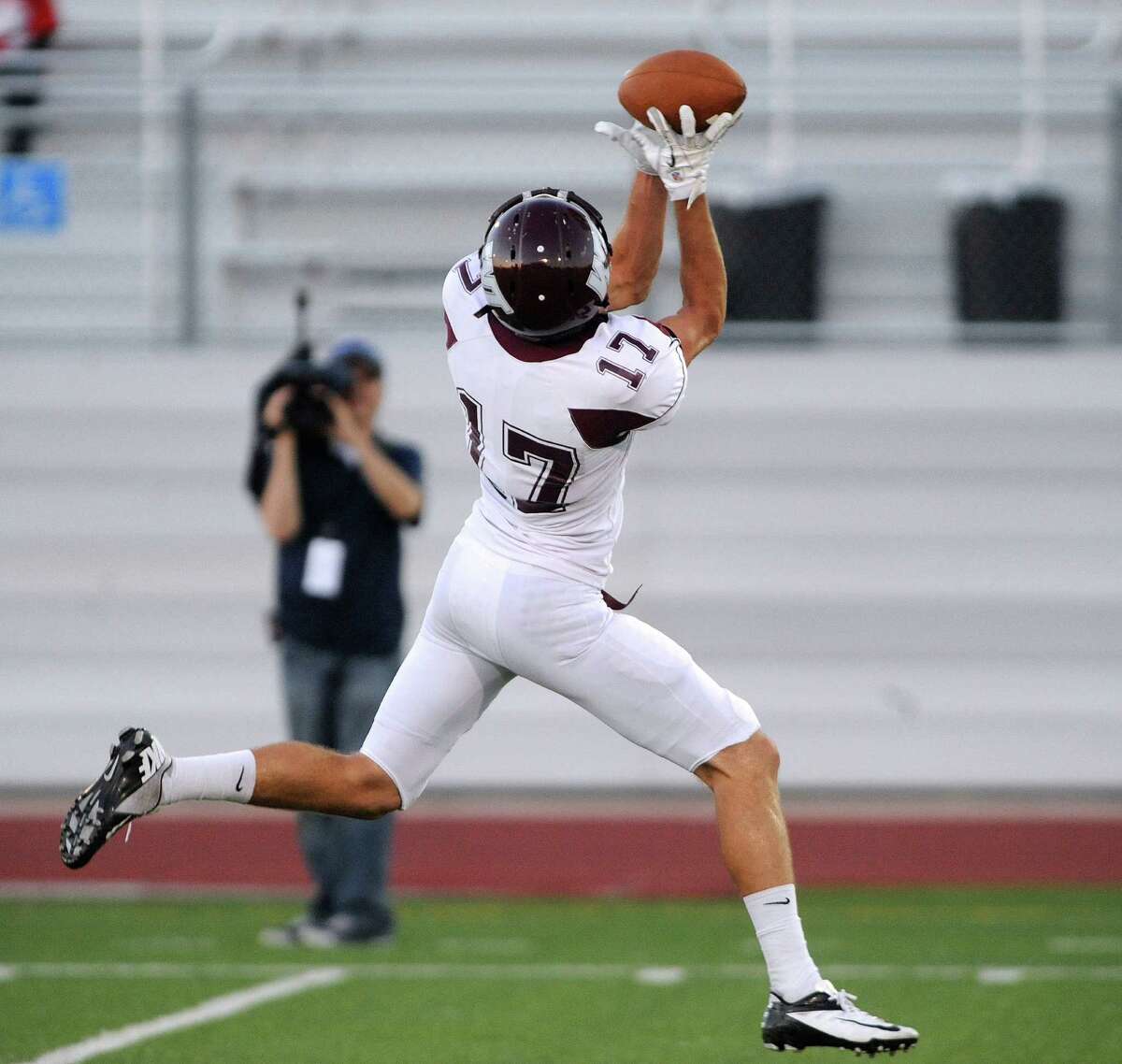 Lance Ratliff of West Texas A&M catches a first-half touchdown pass against Incarnate Word during college football action at Benson Stadium on Saturday, Sept. 22, 2012.
