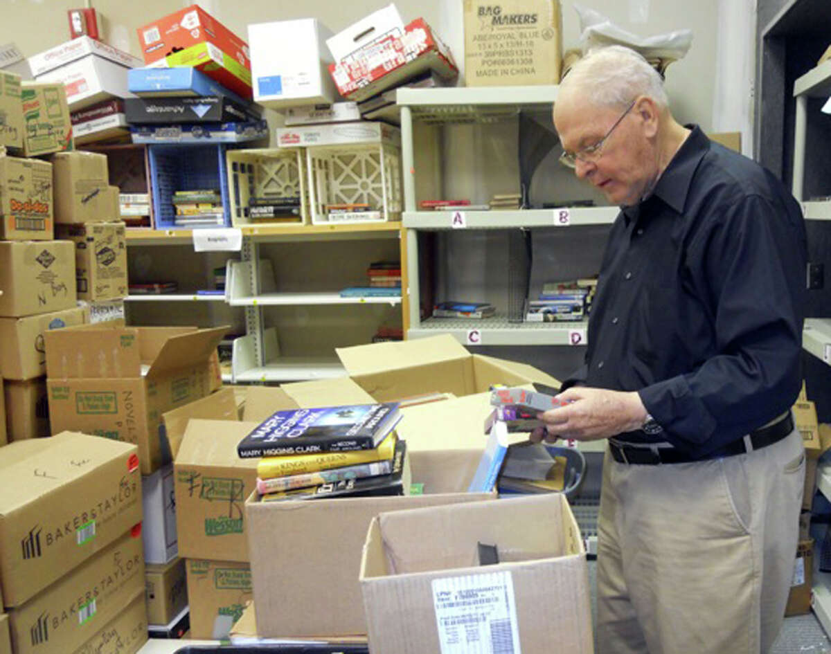 Group readies 100,000 items for book sale