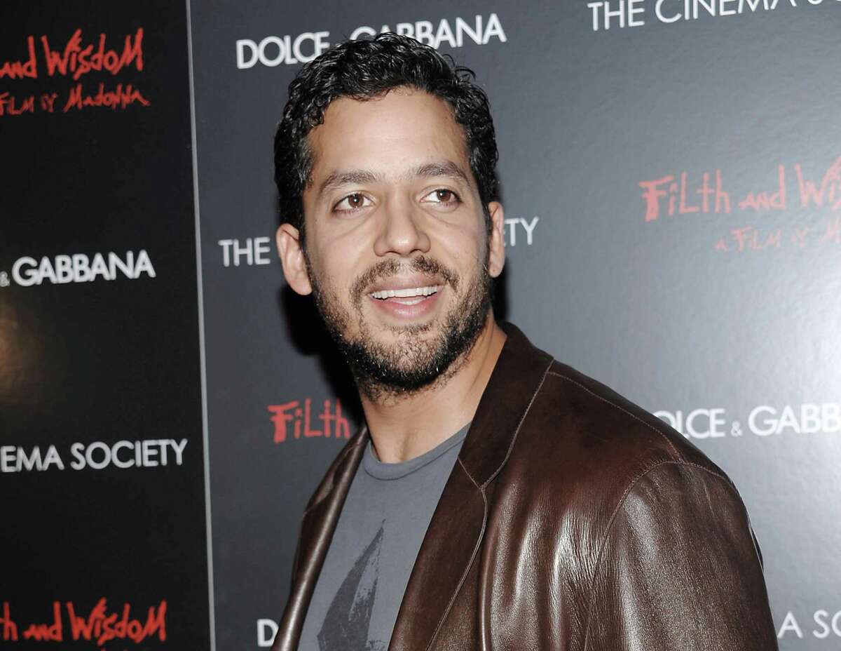 FILE - This Oct. 13, 2008 file photo shows David Blaine attending a Cinema Society and Dolce Gabbana hosted special screening of "Filth and Wisdom" in New York. Blain is returning to New York City Oct. 5-8 for a three day, three night stunt called ?“Electrified: One Million Volts Always On.?” It will be streamed live. Blaine once set a world-record for holding his breath underwater for 17 minutes. He has also been buried alive for a week, encased inside a six-ton block of ice, and stood on top a 100-foot tall pillar for 36 hours without a safety net. (AP Photo/Evan Agostini, file)