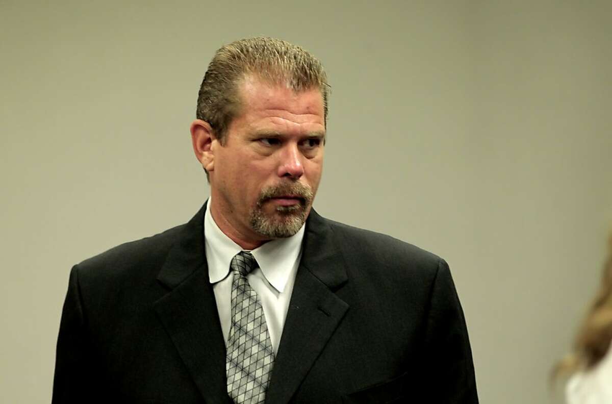 Defendant Norman Wielsch stands up in court to address the judge as he is arraigned with Christopher Butler, Stephen Tanabe, and Louis Lombardi for law enforcement abuse of power case, at the Contra Costa Superior Courthouse, Thursday June 23, 2011, in Walnut Creek, Calif.