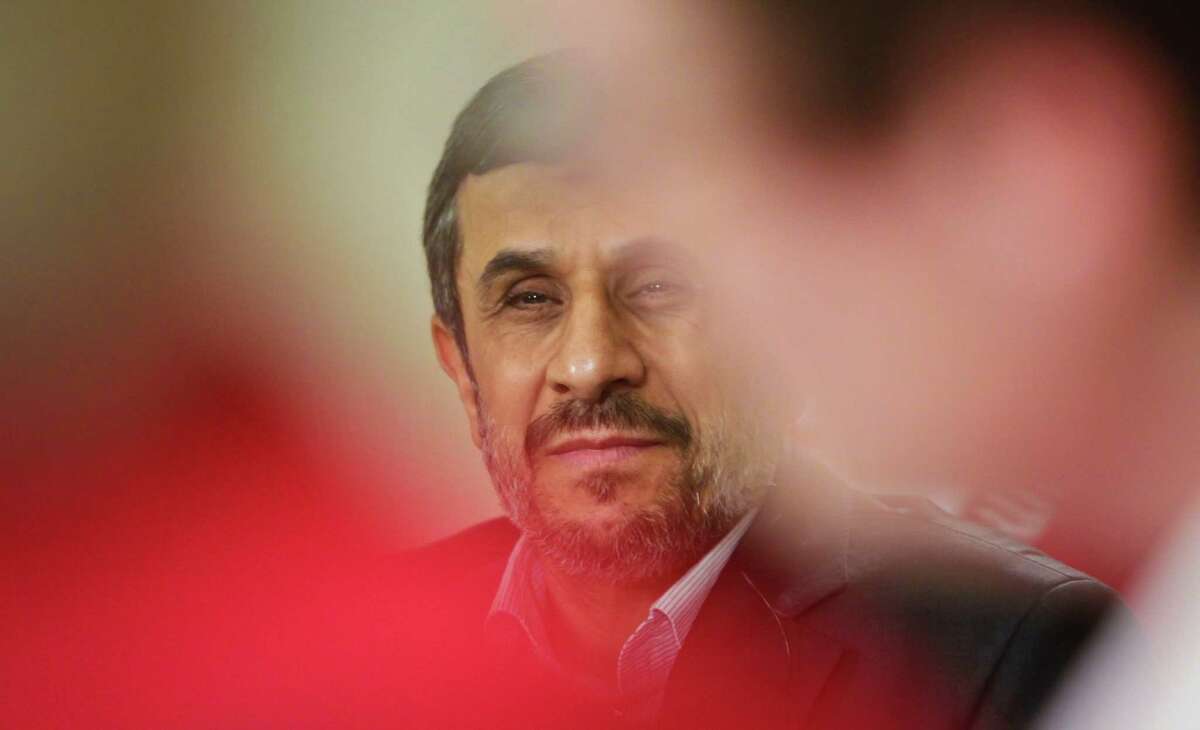 Iranian President Mahmoud Ahmadinejad listens during an exclusive interview with Associated Press editorial staff during his visit for the 67th session of the United Nations General Assembly on Tuesday, Sept. 25, 2012 in New York. (AP Photo/Bebeto Matthews)