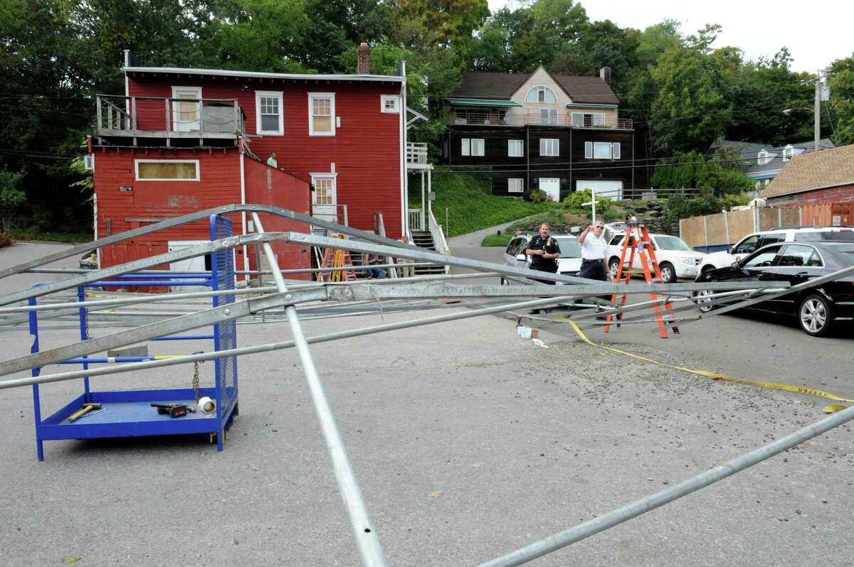A metal frame collapsed Wednesday afternoon in the area of 143 River Road, directly adjacent to Sandy's Summer Stand. Two people were transported to Stamford Hospital with injuries.