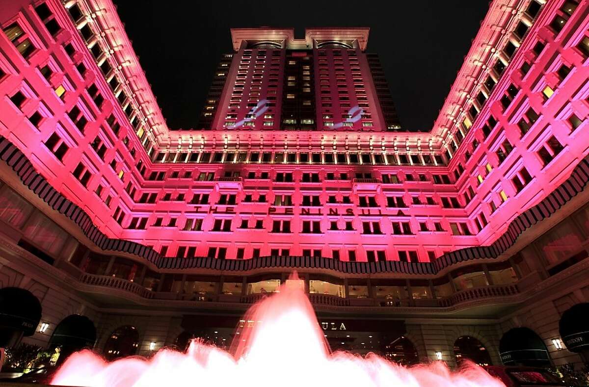 The Peninsula Hong Kong illuminates its exterior in pink in October for Breast Cancer Awareness Month, among other programs at the chain's hotels worldwide designed to raise consciousness or funds for medical research.