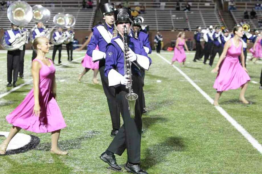 And the Morton Ranch band played on Houston Chronicle