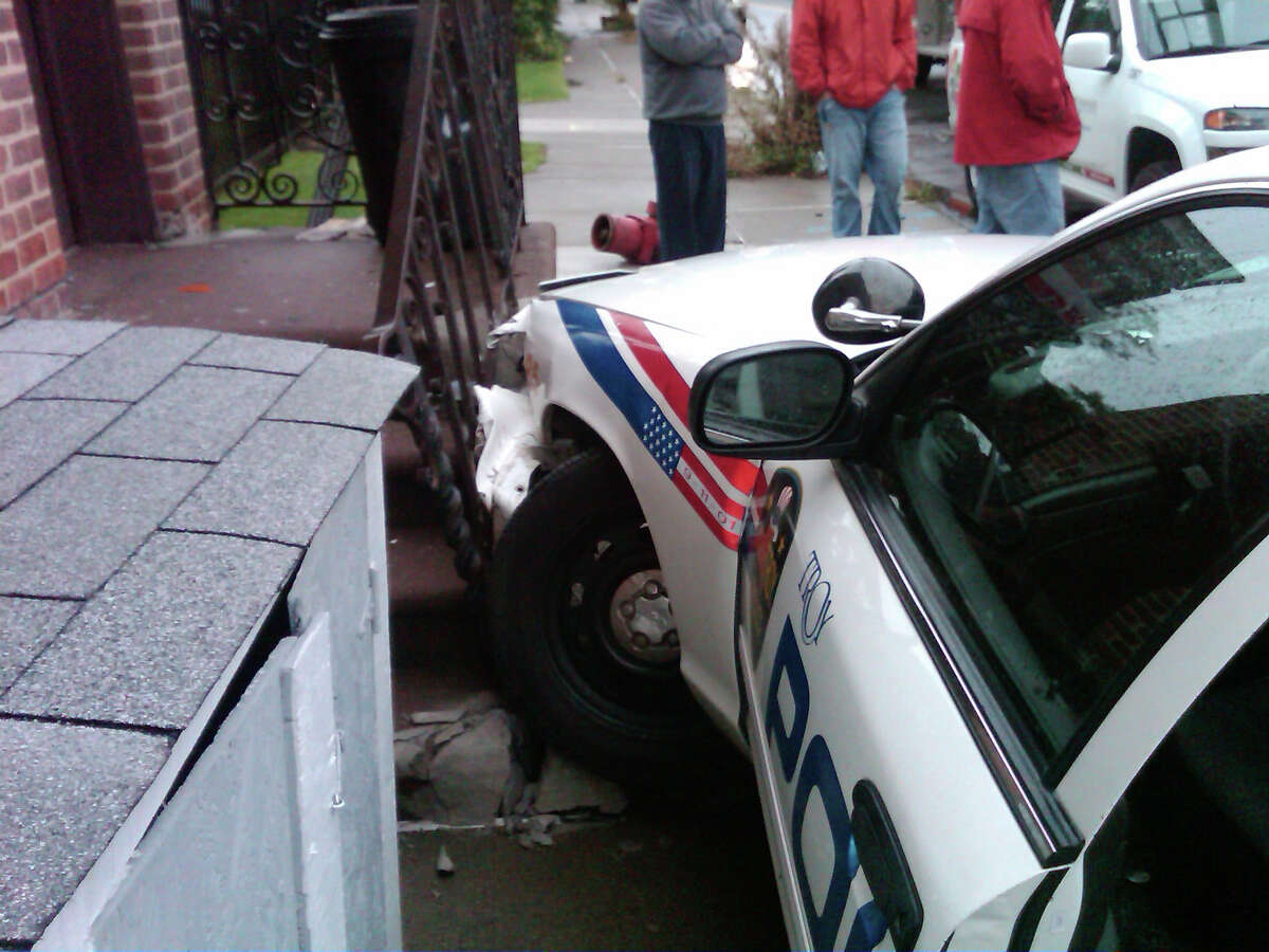 Troy man hurt in crash with city police car