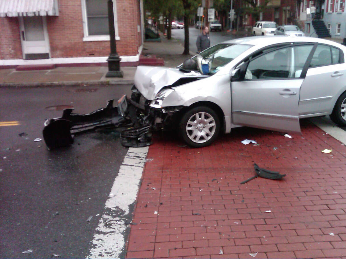 Troy man hurt in crash with city police car