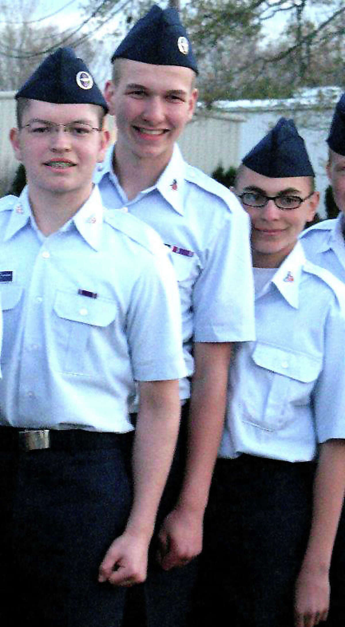 Andre Vasquez, left, and Tyler Giuliano, right, are shown in a Civil Air Patrol encampment photo taken April 2012.